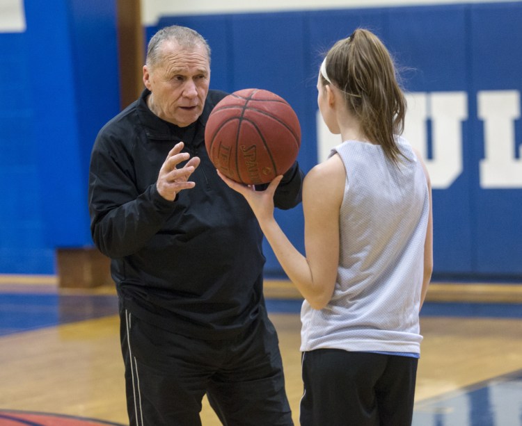 Ron Cote, who coached the Biddeford High boys' and girls' teams, and at the University of New England, works with the Old Orchard Beach girls, including freshman Shani Plante.