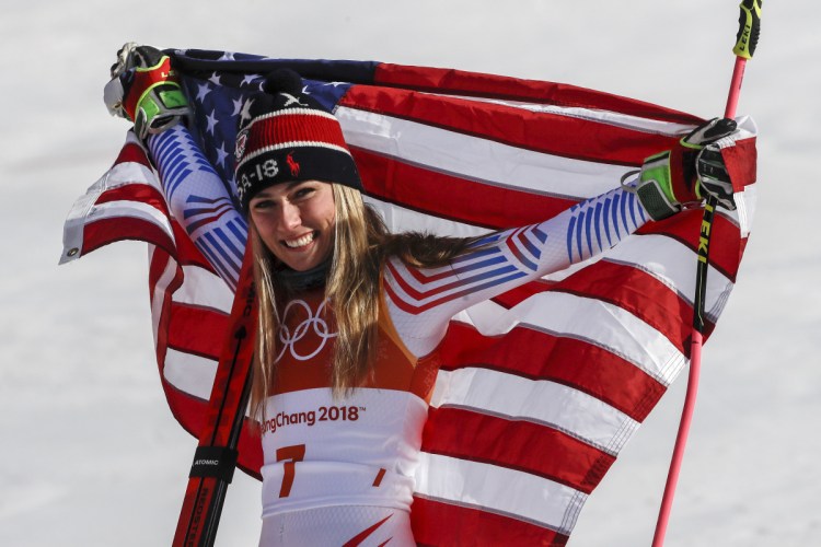 Mikaela Shiffrin, of the United States, celebrates her gold medal for giant slalom on Thursday.
