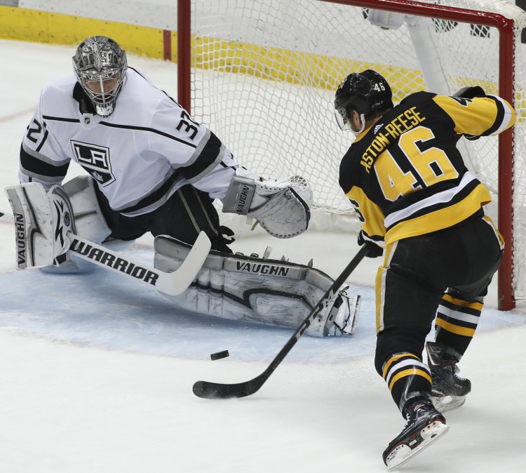 Zach Aston-Reese of the Penguins can't get a shot past Kings goaltender Jonathan Quick in the first period Thursday night. He did, however, score in the third period to break a 1-1 tie.