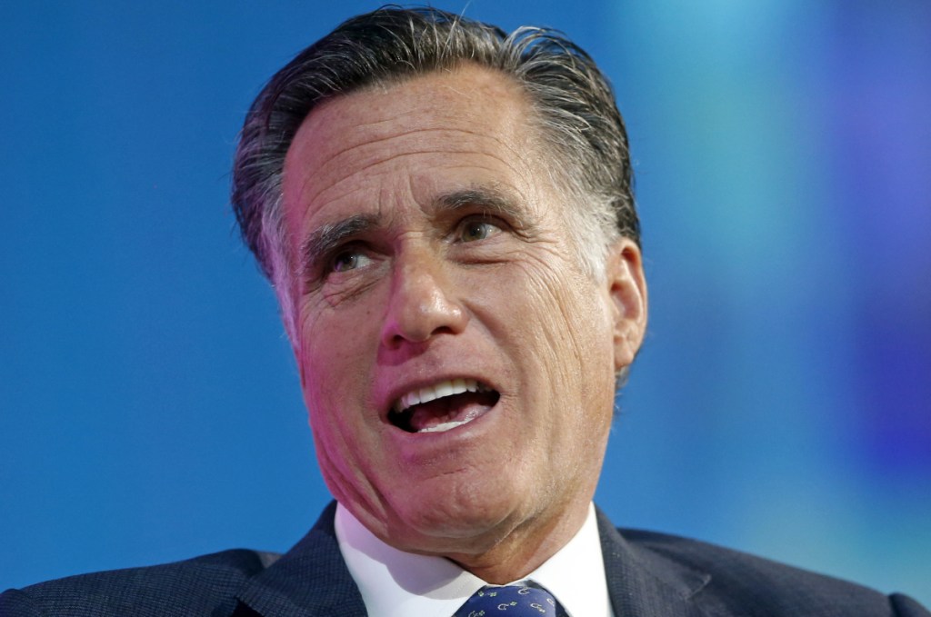 FILE - In this Jan. 19, 2018, file photo, former Republican presidential candidate Mitt Romney speaks about the tech sector during an industry conference dubbed Silicon Slopes, the nickname for Utah's burgeoning cluster of tech companies, in Salt Lake City. Romney is trying for a political comeback as he launches a Senate campaign in Utah.  (AP Photo/Rick Bowmer)