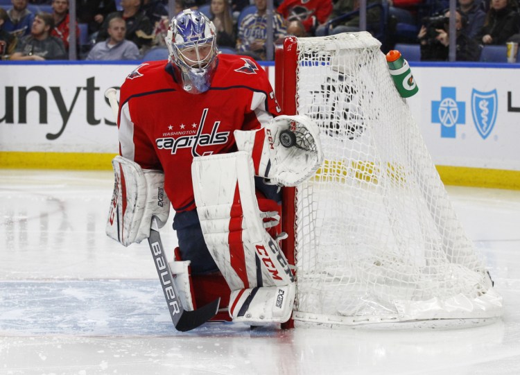 Capitals goalie Philipp Grubauer makes a glove save during the second period Monday against the host Buffalo Sabres.