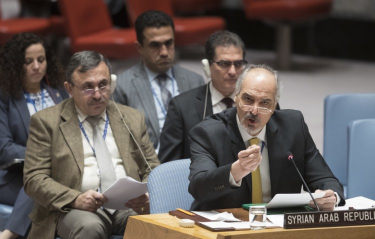 Syrian Ambassador to the United Nations Bashar al-Ja'afari speaks Thursday during a Security Council meeting at the United Nations on the situation in Syria.