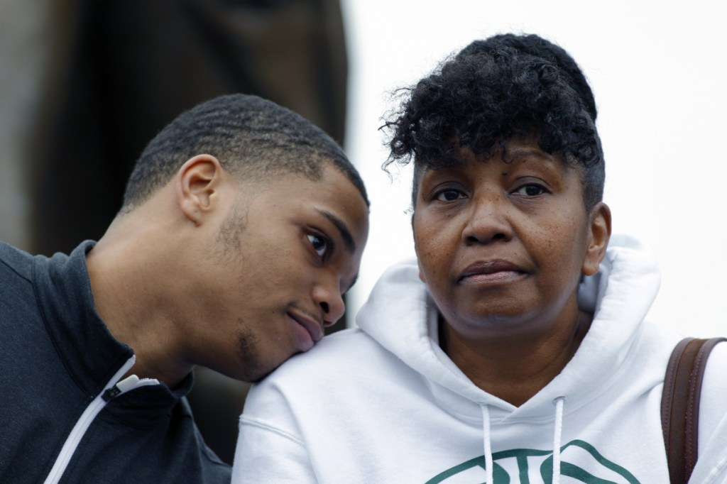 Michigan State's Miles Bridges rests his head on the shoulder of his mother, Cynthia, on April 13, 2017. Bank records and other expense reports that are part of a federal probe into college basketball list a wide range of impermissible payments from agents to at least two dozen players or their relatives, including Bridges and his mother, according to documents obtained by Yahoo Sports.