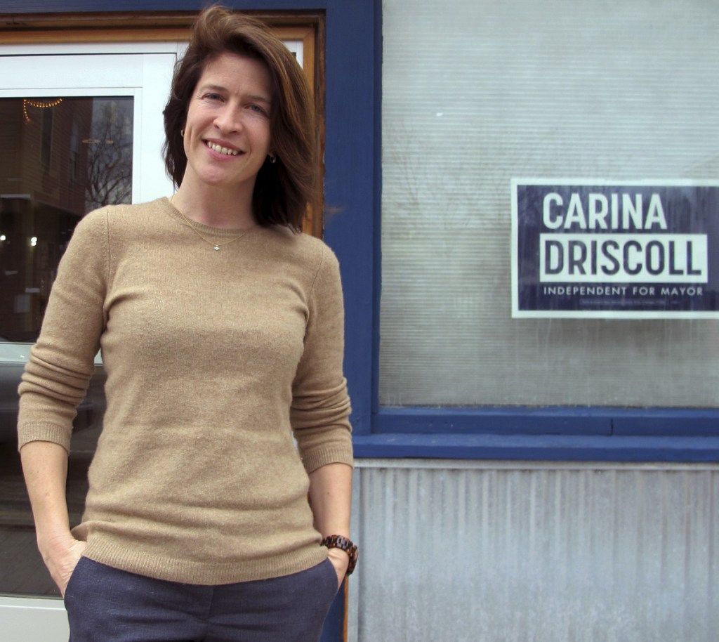 Carina Driscoll, stepdaughter of U.S. Sen. Bernie Sanders, stands outside her campaign office in Burlington, Vt. Driscoll, an independent, is among those running for mayor against incumbent Democrat Mayor Miro Weinberger.