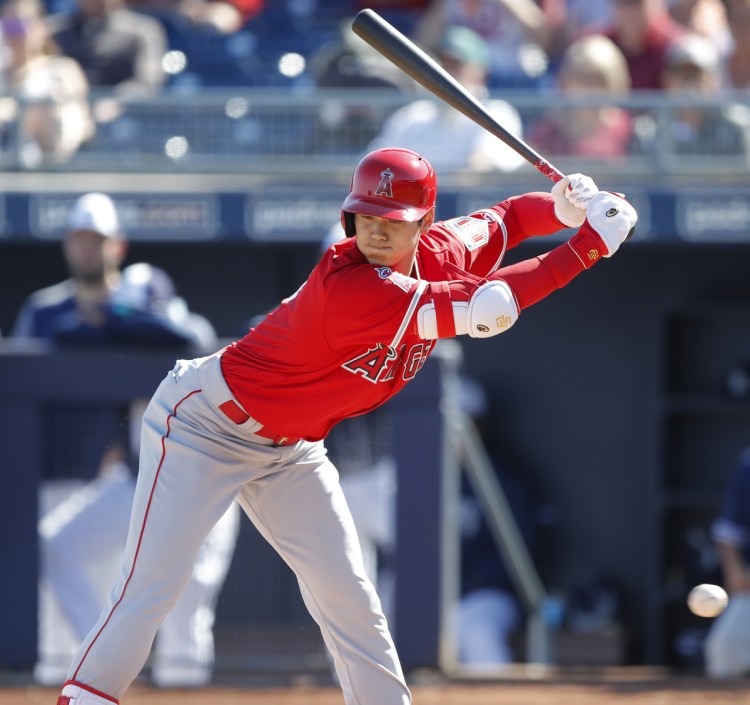 Los Angeles rookie Shohei Ohtani walked twice and had an RBI single against San Diego in his first spring training game as a hitter, Monday in Peoria, Ariz.
