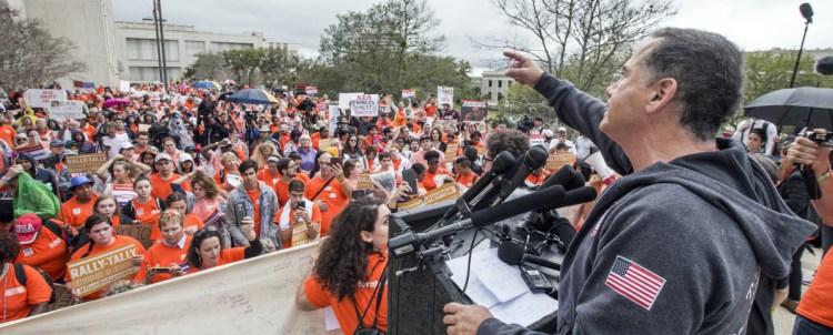 Former Miami Beach Mayor Philip Levine speaks to protesters who marched to the Florida Capitol for the "Rally in Tally" in Tallahassee, Fla., Monday. Levine called for a ban on assault rifles and criticized the NRA for its proposal to arm teachers.