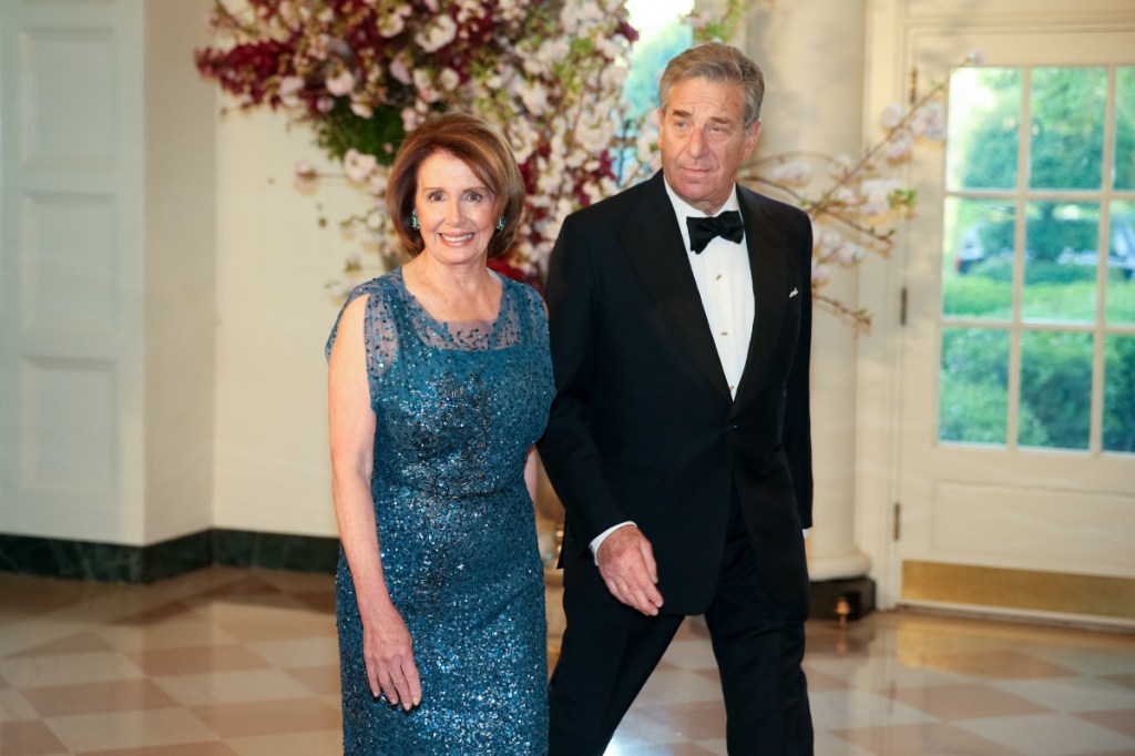 Above, House Minority Leader Nancy Pelosi of Calif., and her husband, Paul, arrive for a state dinner at the White House in 2015. Pelosi, along with Sen. Majority Leader Mitch McConnell, at left, of Kentucky are thought to be two of the 50 richest members of Congress.