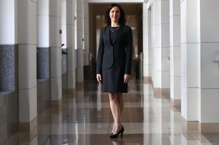 Marlene Laro, partner and COO of Potomac Law Group, at the Ronald Reagan Building and International Trade Center in Washington where her virtual law firm has a workspace.