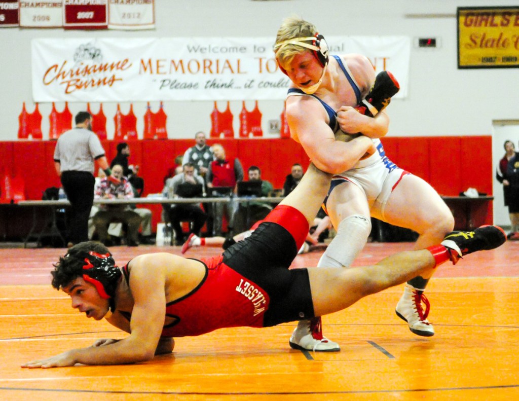 Wiscasset's Sam Strozier, left, Messalonskee's Austin Pelletier compete in the consolation semifinals at the Kennebec Valley Athletic Conference championships Saturday at Cony High School in Augusta. Pelletier won.