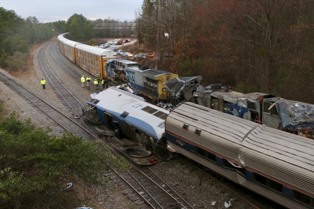 Authorities investigate the scene of a fatal Amtrak train crash Sunday in Cayce, South Carolina. At least two were killed and dozens injured.