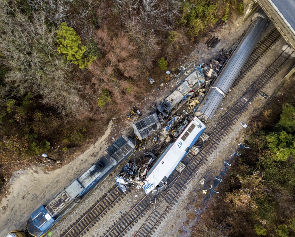 An aerial view of the site of an early morning train crash Sunday between an Amtrak train, bottom right, and a CSX freight train, top left, in Cayce, SC.
