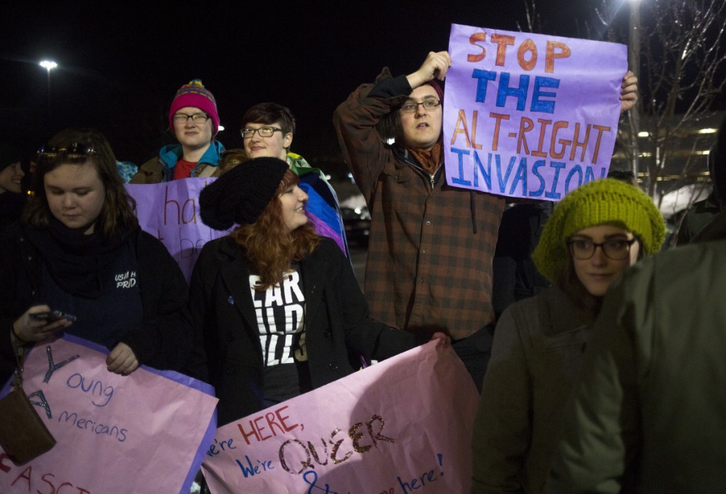 Demonstrators protest last February outside a University of Southern Maine lecture hall during state Rep. Lawrence Lockman's talk, "Alien Invasion: Fixing the Immigration Crisis."