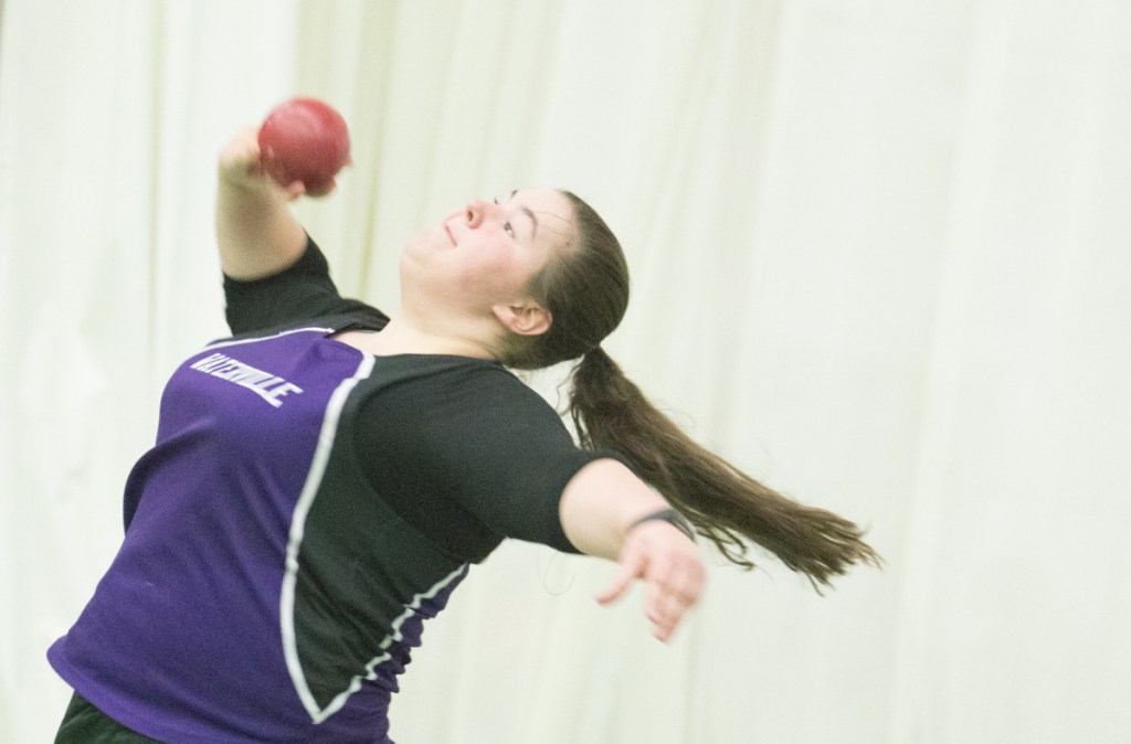 Waterville junior Sarah Cox throwd the shot put during the Kennebec Valley Athletic Conference championship meet Satruday at Bowdoin College. Cox won the event. See story, Page C5.
