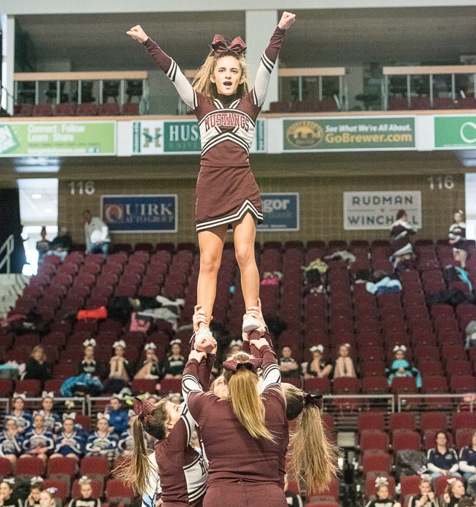 The Monmouth Mustangs compete in the Class C state cheerleading championships Saturday in Bangor.