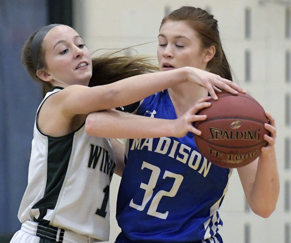 Winthrop freshman Madison Forgue, left, defends Madison senior captain Lauren Hay during a Mountain Valley Conference game earlier this season in Winthrop. The Ramblers and Bulldogs will play Class C South prelim games tonight.