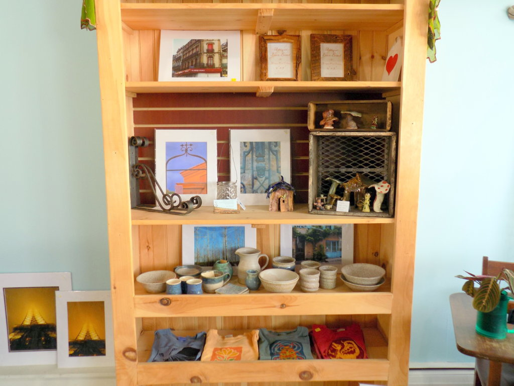 Vera's Iron and Vine on Front Street in Farmington now carries the work of several local artisans. This display case holds frames, pictures, pottery, silk-screened shirts and other items.