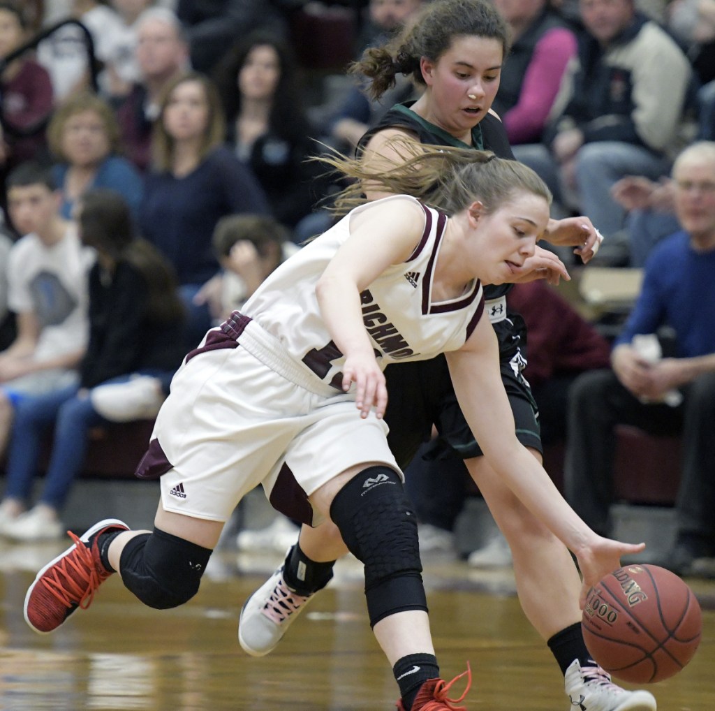 RICHMOND, ME - JANUARY 13: Richmond High School's Ashley Abbott grabs a ball from Waynfleet's Avis Akers during a basketball game on Tuesday February 13, 2018 in Richmond.(Staff photo by Andy Molloy/Staff Photographer)