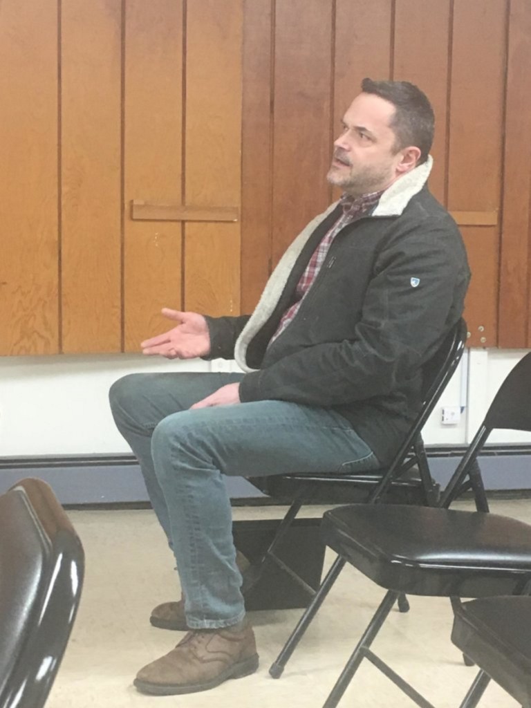 Scott Holbrook, owner of LeBaron Bonney Co., of Amesbury, Mass., attends Thursday evening's Wilton Planning Board meeting to discuss moving into the Bass-Wilson building on 284 Main St. The board approved his request.