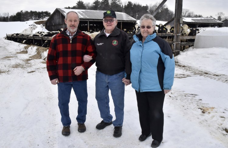 The town of Anson is recognizing the Williams Farm in North Anson in the annual report for this year's Town Meeting. From left are Richard Williams with his parents, Harvey and Jean Williams.