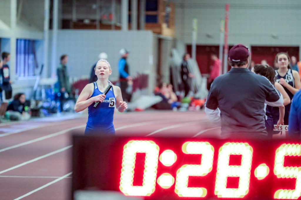 Lawrence's Cassandra Richards nears the end of the 4x800 relay at the Class B indoor track state championships Saturday at Bates College.