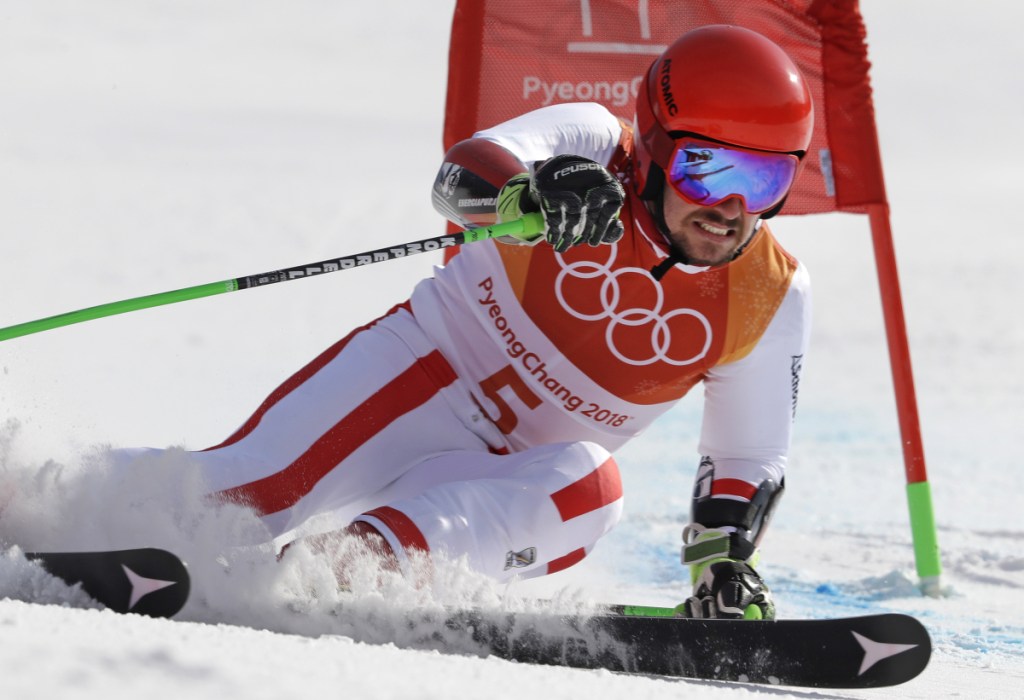 Austria's Marcel Hirscher skis to the gold medal in the second run of the men's giant slalom Sunday at the 2018 Winter Olympics in Pyeongchang, South Korea.