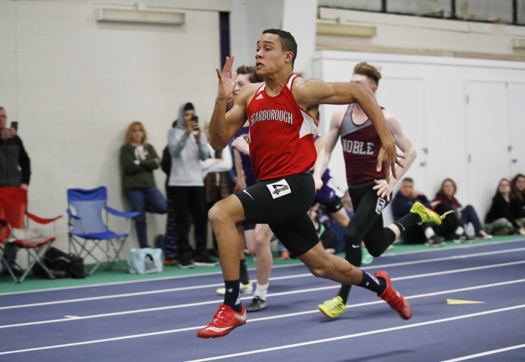 Jared Flaker of Scarborough runs in the 55-meter dash to set a new state record during the Maine Class A track and field championships on Monday in Gorham.
