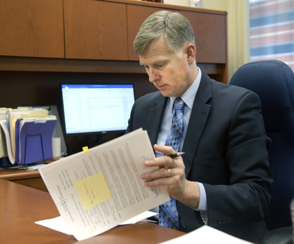 Maine State Police Col. Robert Williams, attending a meeting at his office at the Department of Public Safety in Augusta, announced Tuesday that he's retiring to assume the position of security director at Colby College in Waterville.