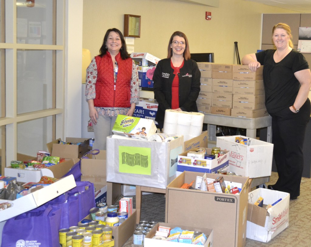 Great Food Drive helpers, from left, are Rebecca Wood, M. Breau and Kristen Grondin.