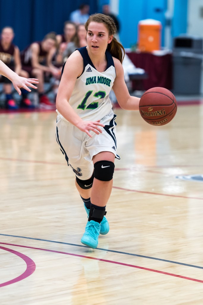 University of Maine at Augusta guard Carmen Bragg dribbles during a game earlier this season. The Moose will play in the United States Collegiate Athletic Association Division II National Championship Tournament.
