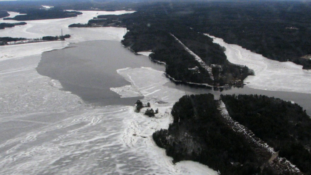 Some open water is visible Thursday at Chops Point in Woolwich in a view from a Coast Guard airplane. The agency is preparing to send ice-breaking boats up the river next week.