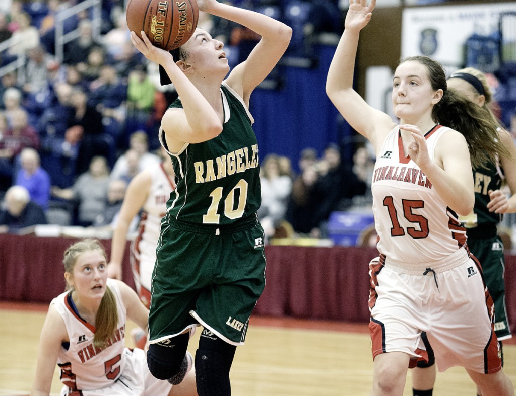 Brooke Egan of Rangeley shoots over Deja Doughty of Vinalhaven during the fourth quarter of the Class D South title game Saturday in Augusta.