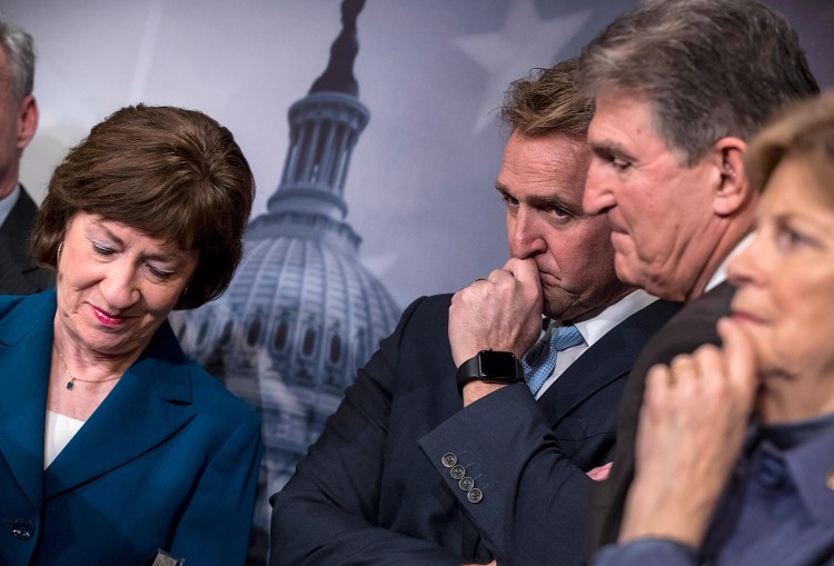 From left, Sen. Susan Collins, R-Maine, Sen. Jeff Flake, R-Ariz., Sen. Joe Manchin, D-W.Va., and Sen. Jeanne Shaheen, D-N.H., at a news conference on the bipartisan immigration deal they reached, at the Capitol in Washington on Thursday. The plan was rejected, as was a Republican plan promoted by President Trump.