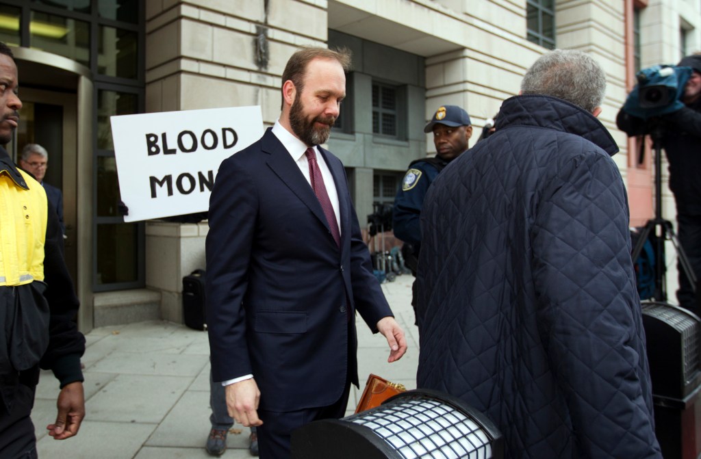 Rick Gates leaves federal court in Washington, Friday, Feb. 23, 2018. Gates, a former top adviser to President Donald Trump's campaign pleaded guilty in the special counsel's Russia investigation to federal conspiracy and false statements charges. 