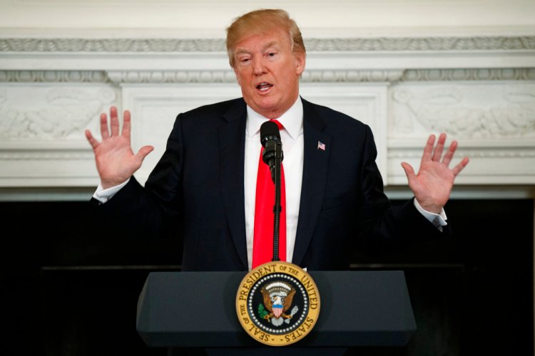 President Trump speaks during a meeting with members of the National Governors Association at the White House Monday. Trump predicted that the powerful NRA will "do something" to respond to the escalating concern nationwide about guns. 