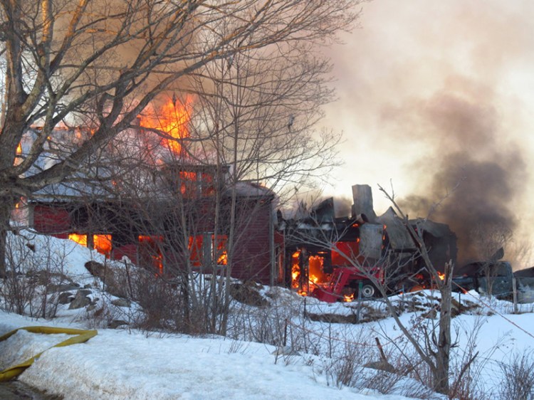 The wood-framed farmhouse of Hartford historian Lorraine Parsons was destroyed by flames Wednesday afternoon.