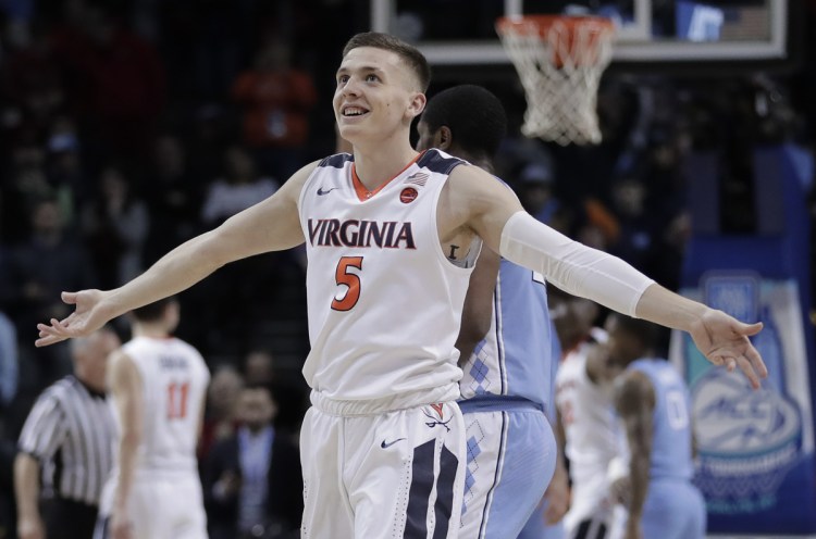 Guard Kyle Guy and Virginia earned a No. 1 seed in the NCAA Division I men's basketball tournament.
