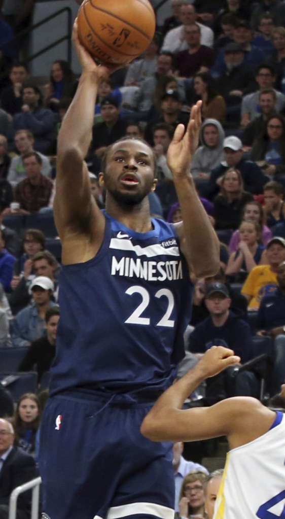 Andrew Wiggins of the Minnesota Timberwolves finds room to shoot Sunday during the 109-103 victory against the Golden State Warriors. Wiggins finished with 23 points.