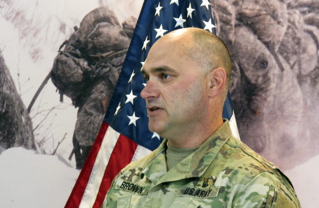 Vermont National Guard Lt. Col. Matthew Brown speaks Friday in Jericho, Vermont, about the avalanche that injured six soldiers when it hit while the slope was being checked for safety Wednesday.  The soldiers were carried about 900 feet down the mountain after the snow on the slope gave way.