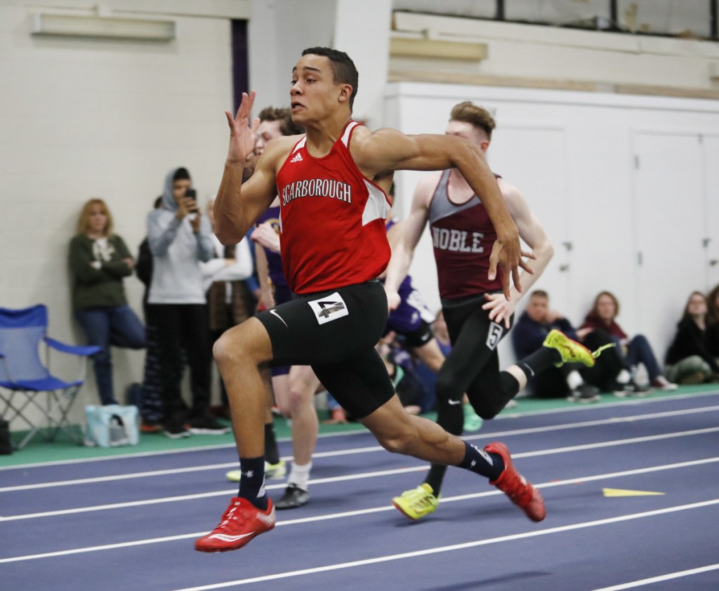 Jared Flaker of Scarborough sprints to the finish in the 55 meters at the Class A state championships. His time of 6.50 seconds was just one of the records that fell during a dominating indoor track season.