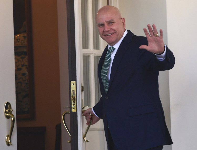 National security adviser H.R. McMaster waves as he walks into the West Wing of the White House in Washington on Friday.