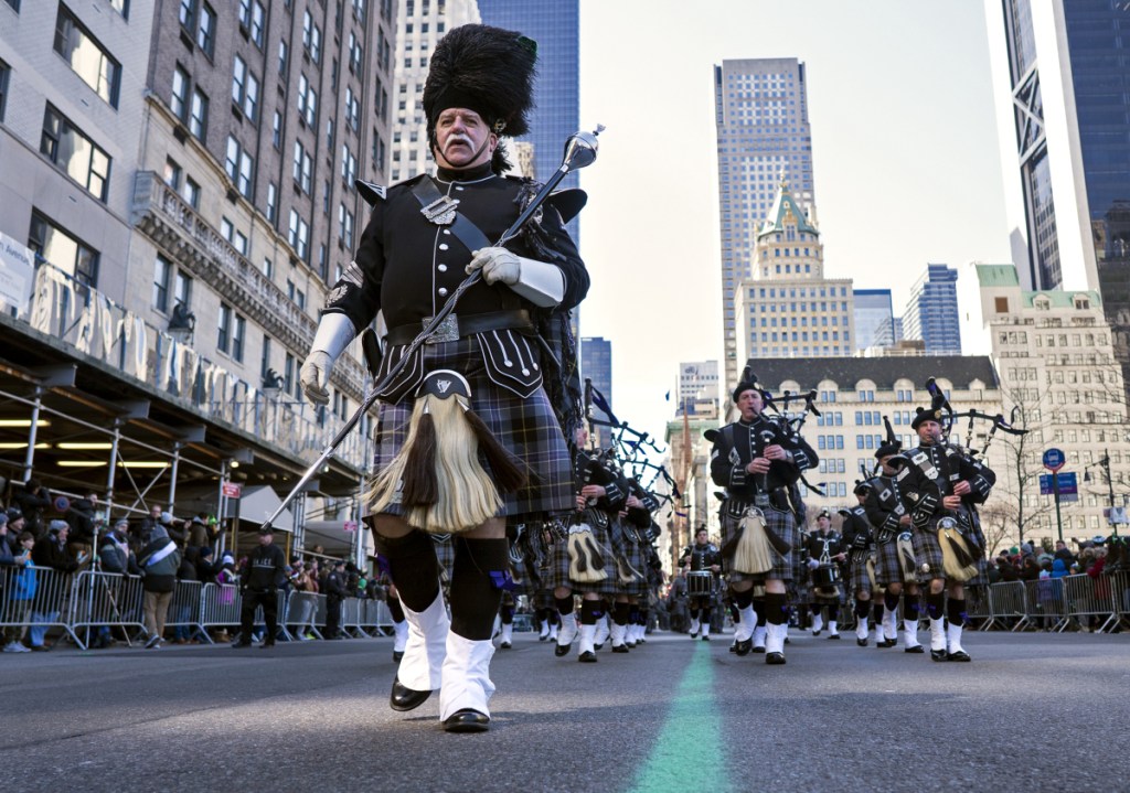 A bagpipe unit representing the New York State Police takes part in the St. Patrick's Day parade on Fifth Avenue in New York on Saturday. Several bagpipe bands led a parade made up of over 100 marching bands after Democratic Gov. Andrew Cuomo spoke briefly, calling it a "day of inclusion" and adding: "We're all immigrants."
Associated Press