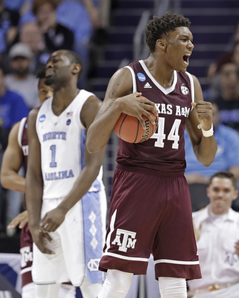 Robert Williams of Texas A&M knew how to control the ball Sunday, finishing with 13 rebounds and combining to dominate the inside with teammate Tyler Davis in an 86-65 victory against North Carolina. The Aggies advanced to the Sweet 16 for the second time in three years.