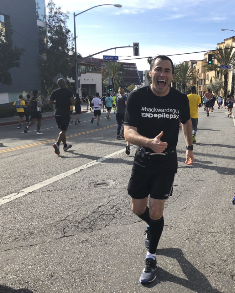 Lawyer Loren Zitomersky runs the Los Angeles Marathon backward on March 18. In Boston, he'll have to average about 8½ minutes per mile to beat the world record.