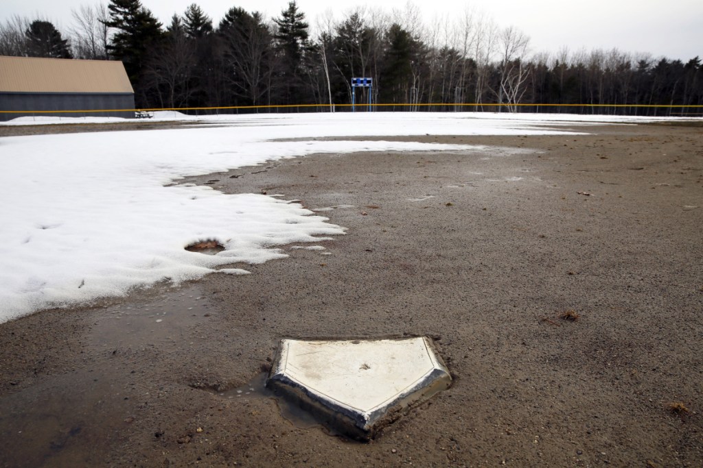 Home plate may be ready for baseball at Falmouth High, but the field remains steeped in muddy meltwater with the start of the season rapidly approaching.