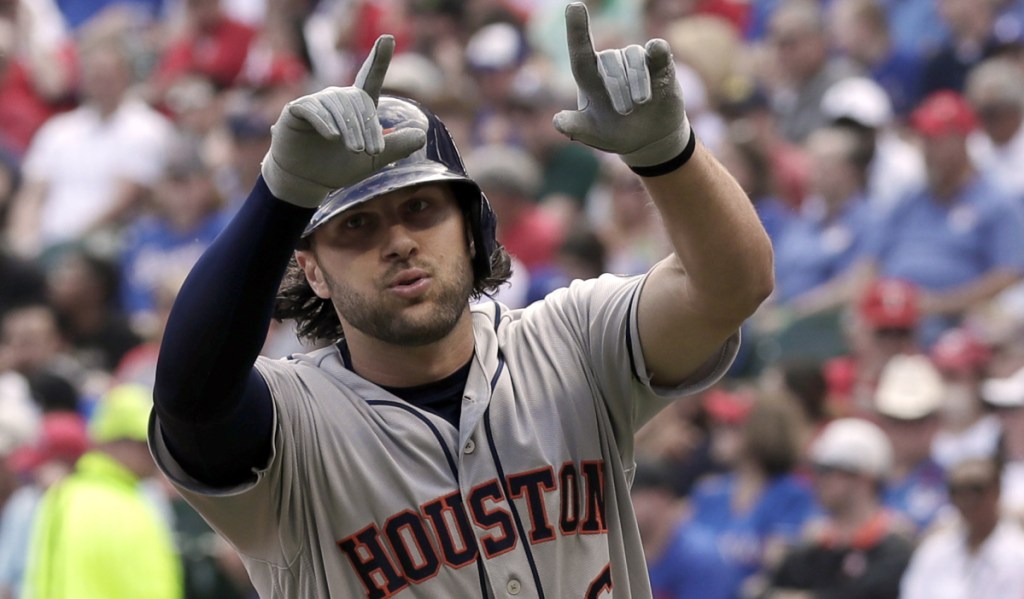 Jake Marisnick of the Houston Astros celebrates a solo home run Thursday off Cole Hamels of the Texas Rangers in the fourth inning of Houston's 4-1 victory on Opening Day.