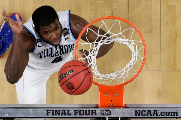 Villanova forward Eric Paschall scores during the second half  of his team's win over Kansas in the semifinals of the Final Four in San Antonio.