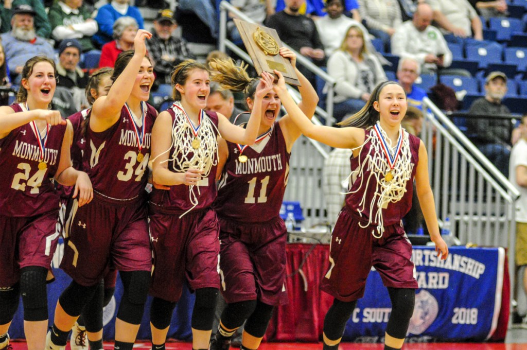 The Monmouth Academy girls basketball team reacts after defeating Boothbay in the Class C South final last week at the Augusta Civic Center. The Mustangs face Houlton in the state championship game this weekend.