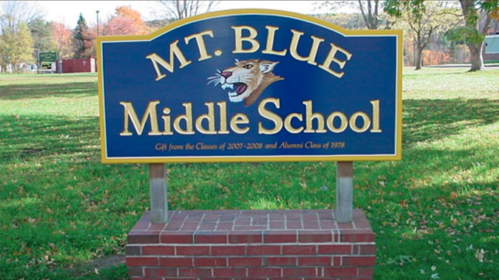Two Mt. Blue Middle School students were summoned on a charge of terrorizing and suspended from school for five days.