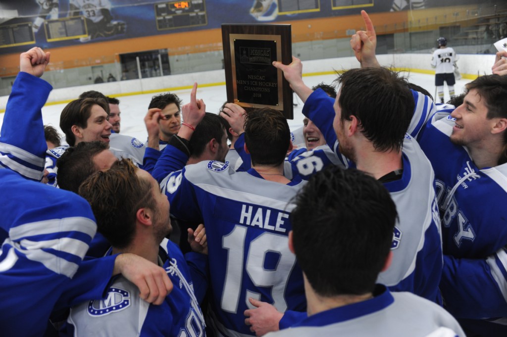 Contributed photo
The Colby College hockey team celebrates its victory over Trinity in the New England Small College Athletic Conference championship game Sunday in Hartford, Connecticut.