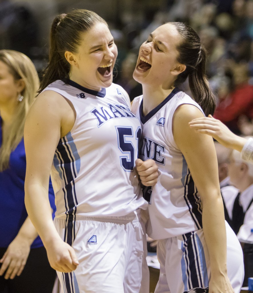 Portland Press Herald photo by Carl D. Walsh 
 University of Maine forward Fanny Wadling, left, and guard Blanca Millan celebrate in the closing seconds, with victory in hand, against the University of New Hampshire during America East semifinal action Sunday at the Cross Insurance Arena in Portland.